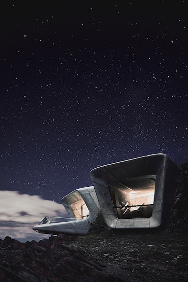a futuristic house sitting on top of a mountain at night.