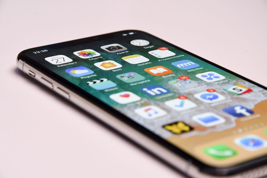 An iphone x is shown on a white background.