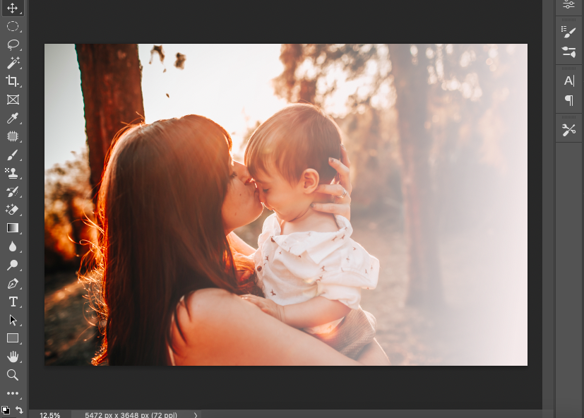 A photo of a mother and child kissing in adobe photoshop.