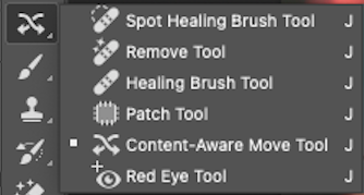 Adobe photoshop cs6 spot healing brush tool.