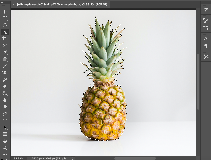 A photo of a pineapple in adobe photoshop.