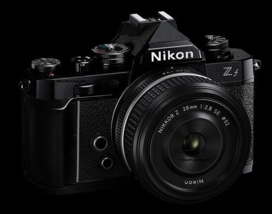 The nikon dx-format camera is shown on a black background.