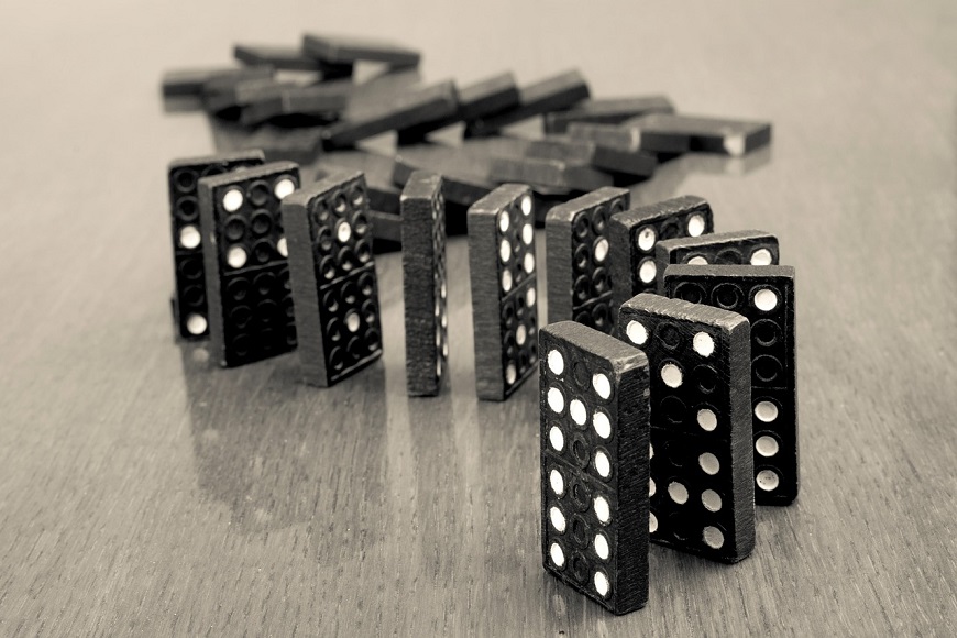 Dominoes on a wooden table.