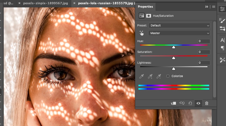 A photo of a woman's face in adobe photoshop.