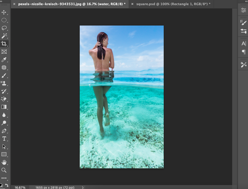A photo of a woman in the water in adobe photoshop.
