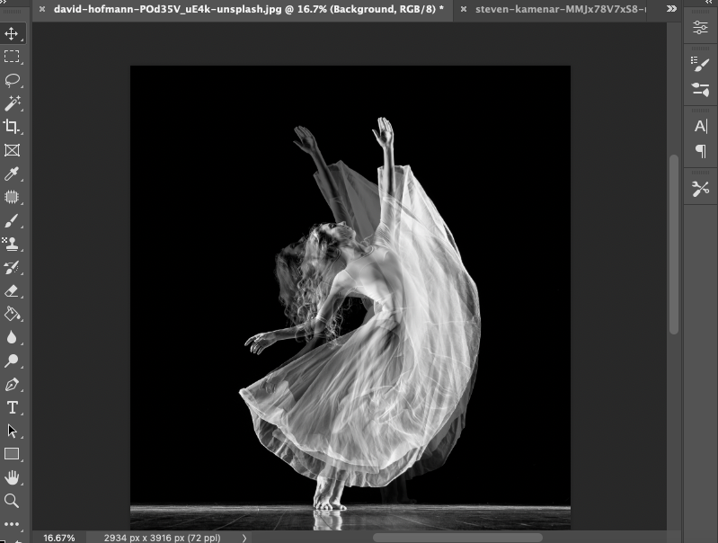 A photo of a dancer in black and white.