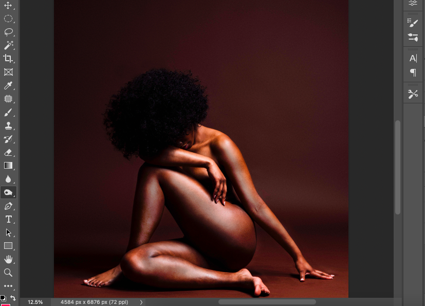 A photo of a nude woman in adobe photoshop.