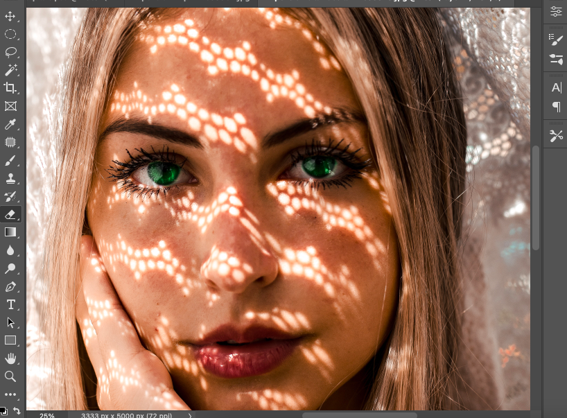 A photo of a woman with green eyes in adobe photoshop.