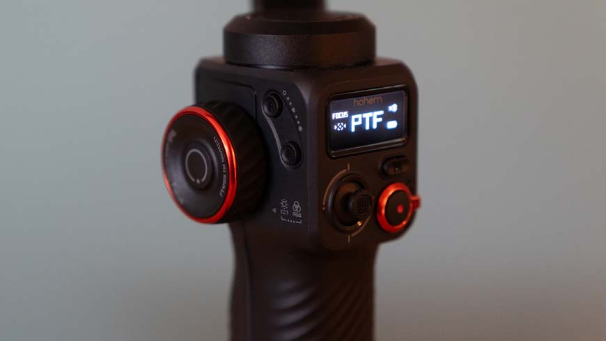 A gimbal control with a digital display on it.