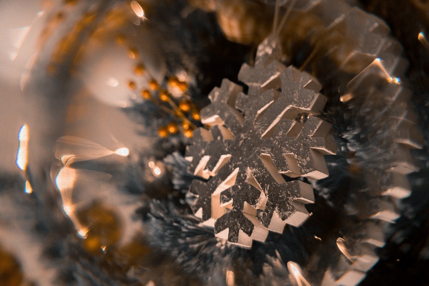 A blurry image of a snowflake on a christmas tree.
