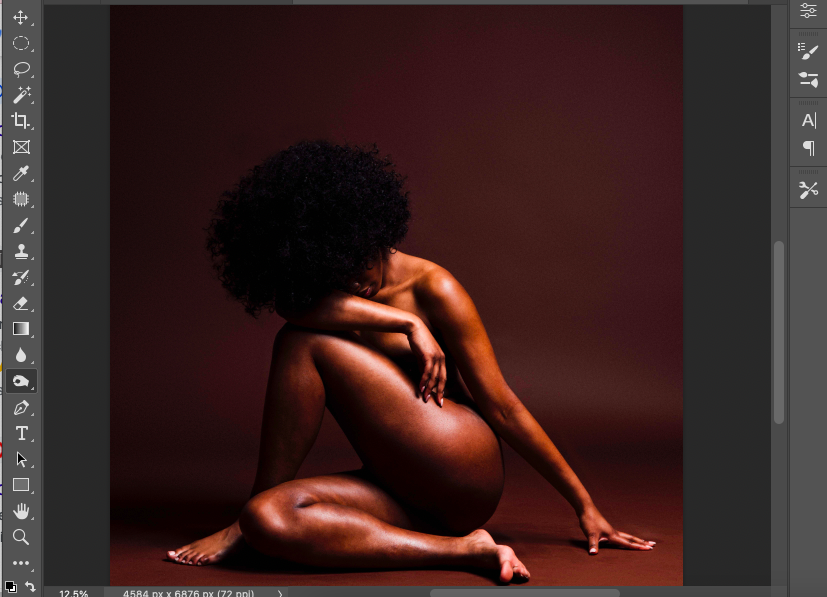 A photo of a nude woman in adobe photoshop.