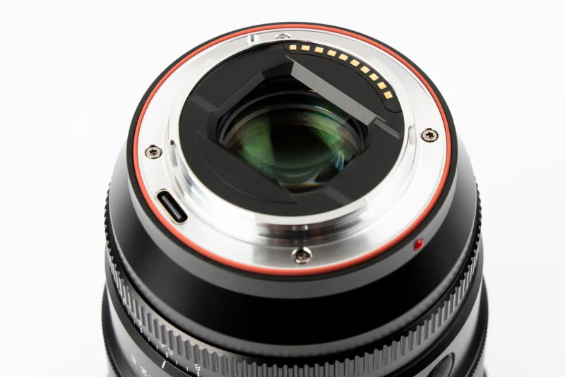 A close up of a lens on a white background.