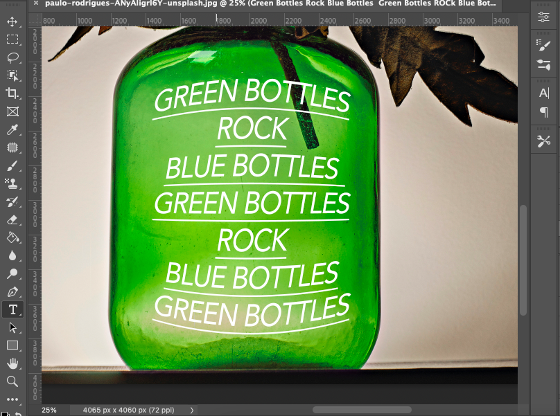 A green bottle with the words green bottles rock green bottles rock.