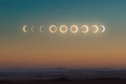 Four phases of a solar eclipse in the desert.