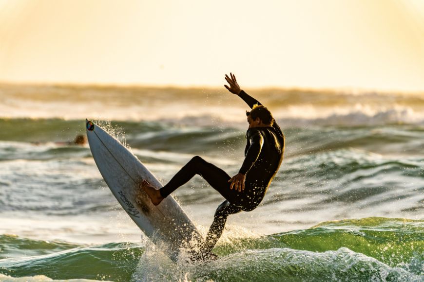 A surfer is riding a wave in the ocean.