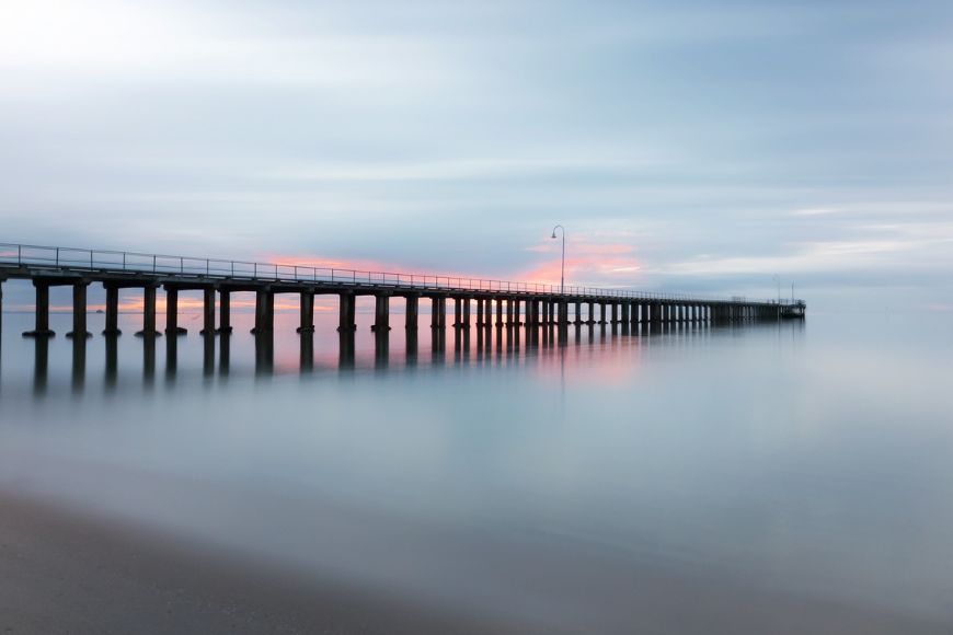 An image of a pier at sunset.