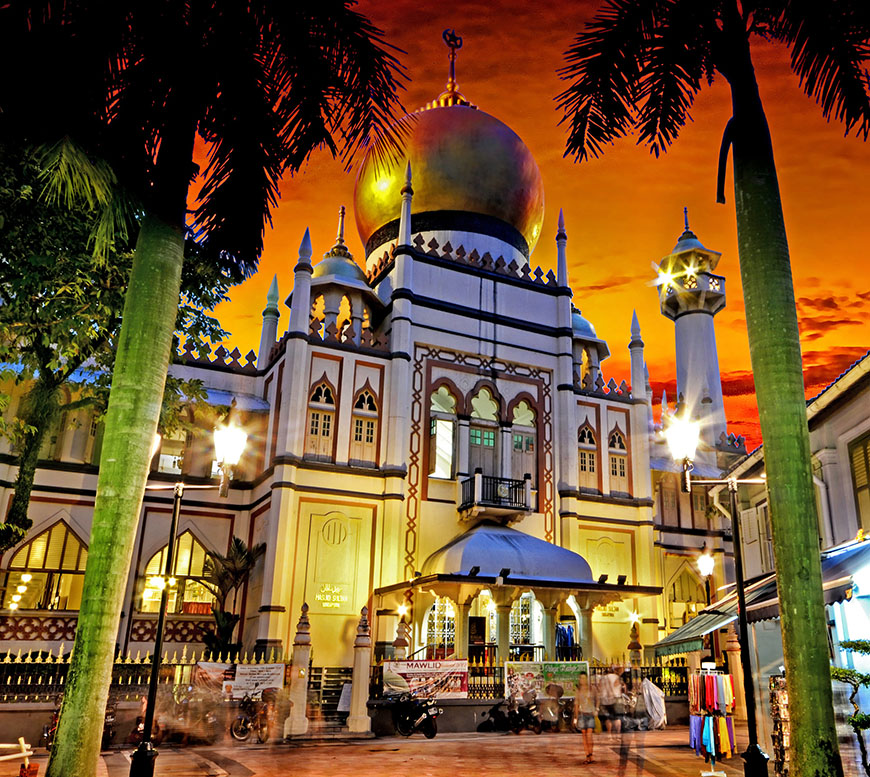 A mosque lit up at dusk in kuala lumpur, malaysia.