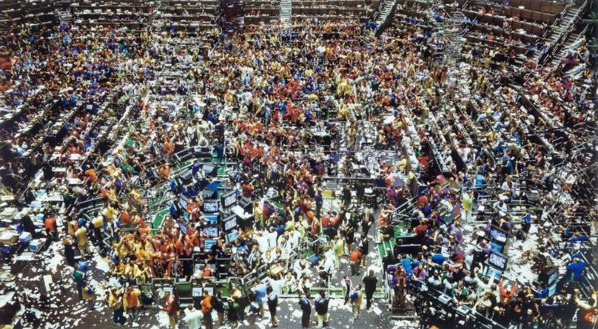 An image of a crowd of people in a large building.