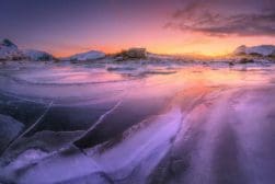 A beautiful sunrise over a frozen lake captured using an FLD filter