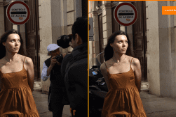 A woman in a brown dress is walking down the street.
