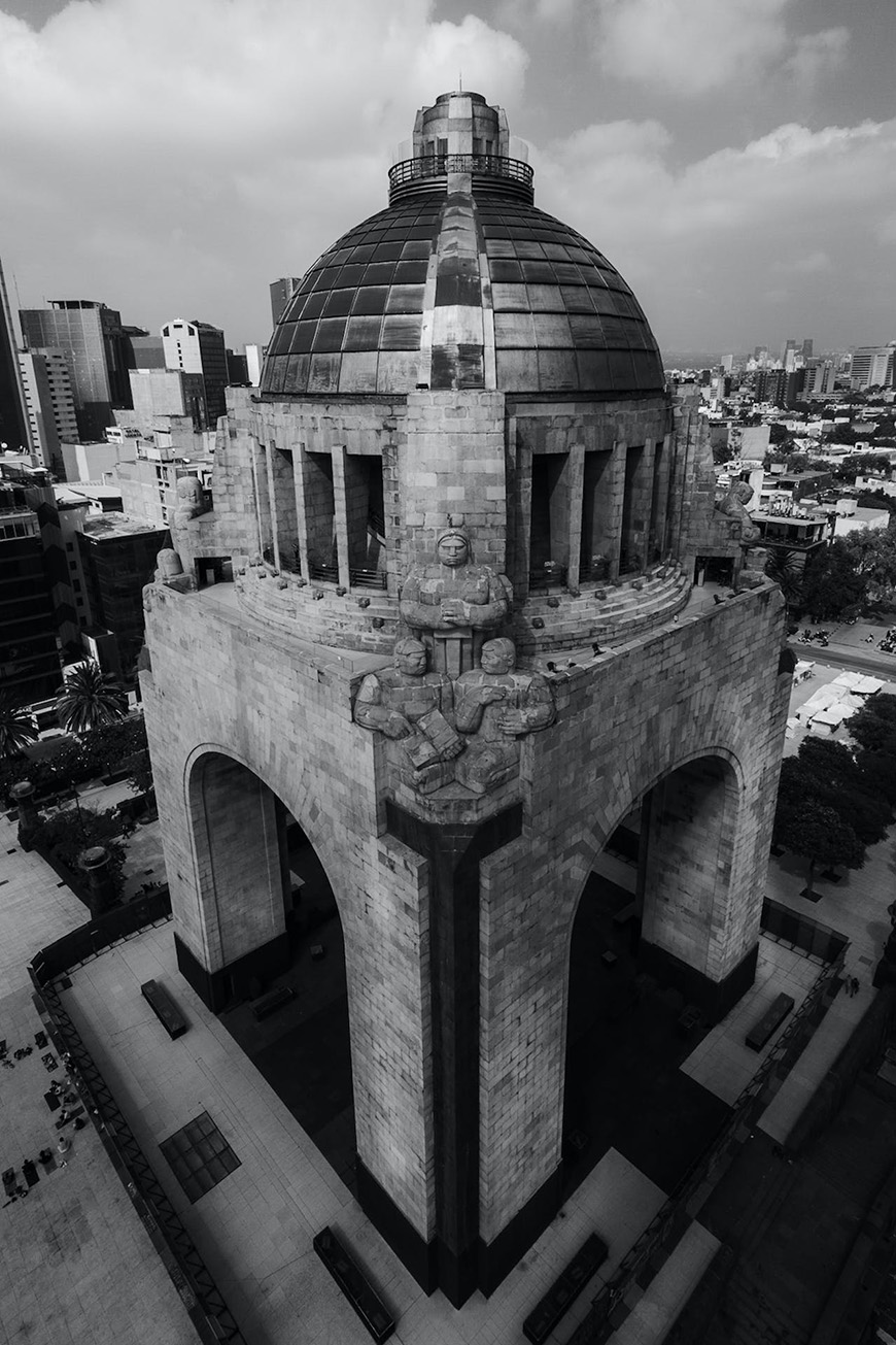 A black and white photo of a monument in mexico city.