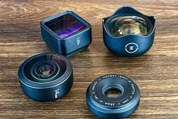 Three different types of camera lenses on a table.