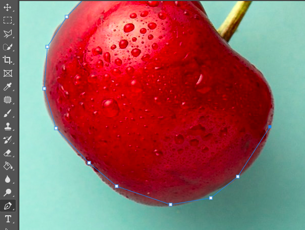 A photo of a cherry with water droplets on it.