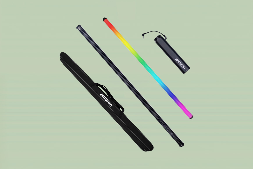 A rainbow - colored light stick and a black bag.