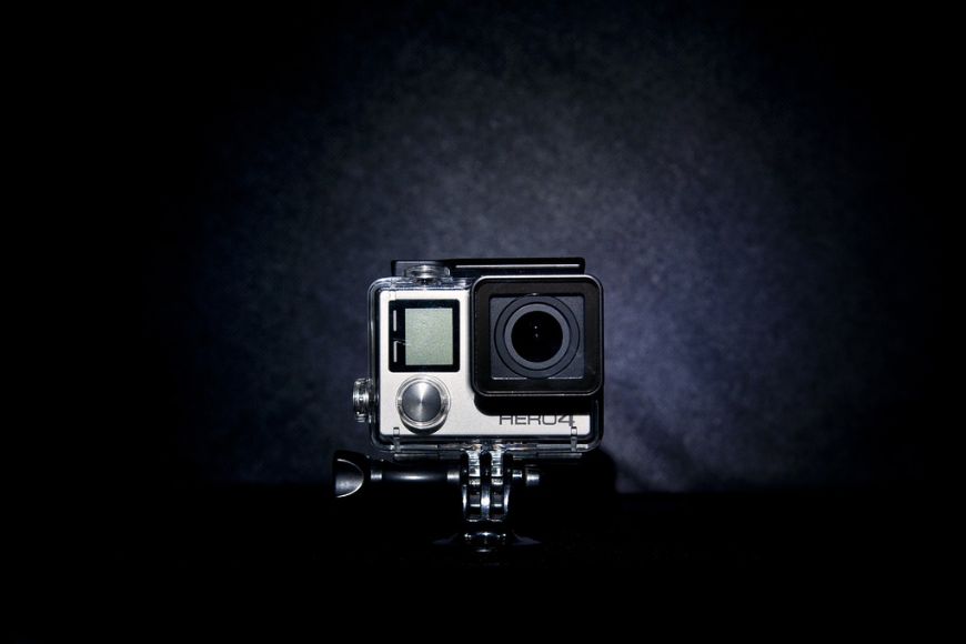 A gopro hero on a black background.