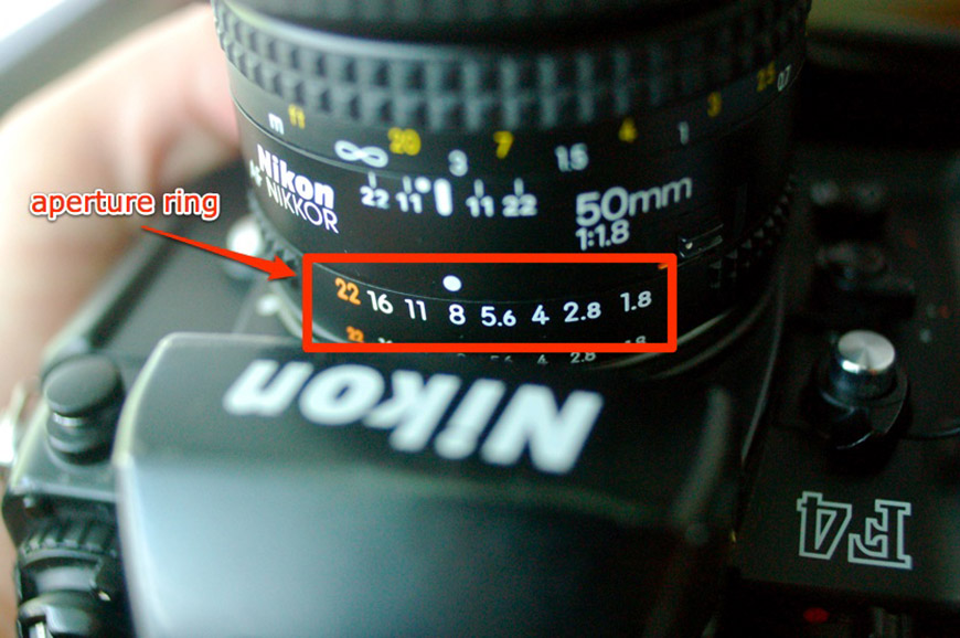 A nikon lens with a number labeled on it.