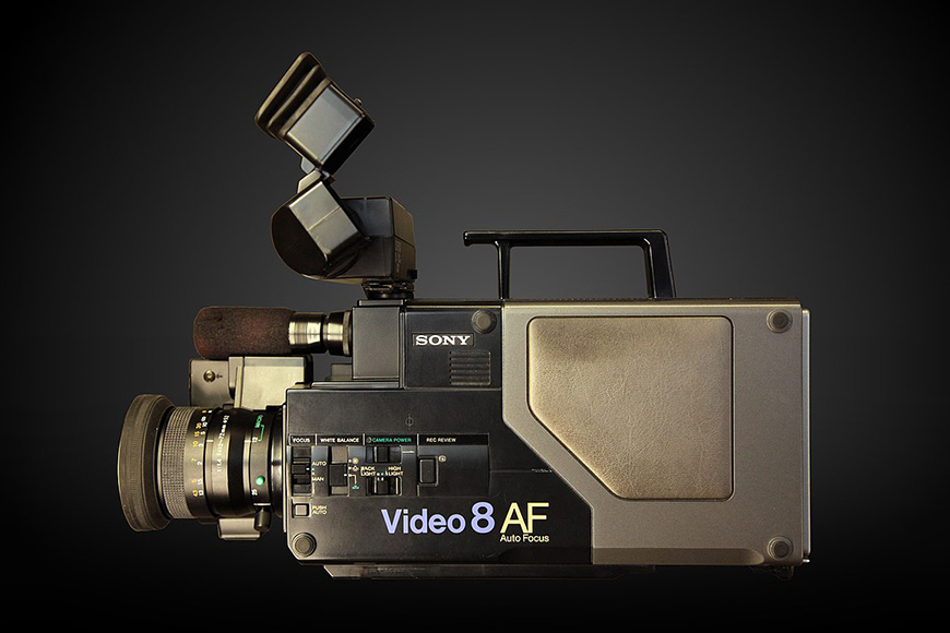 A video camera on a black background.