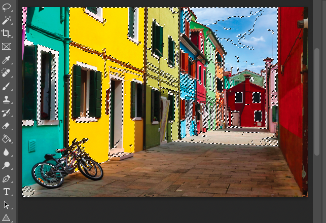 A photo of a colorful street in burano.