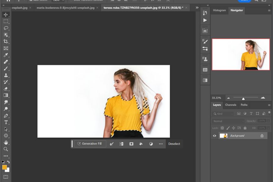A photo of a woman in a yellow shirt in adobe photoshop.
