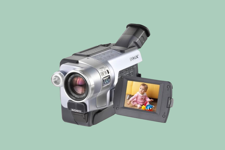 A video camera with a child's face on it.