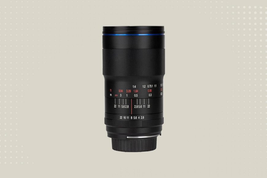 A black camera lens with red and blue numbers.