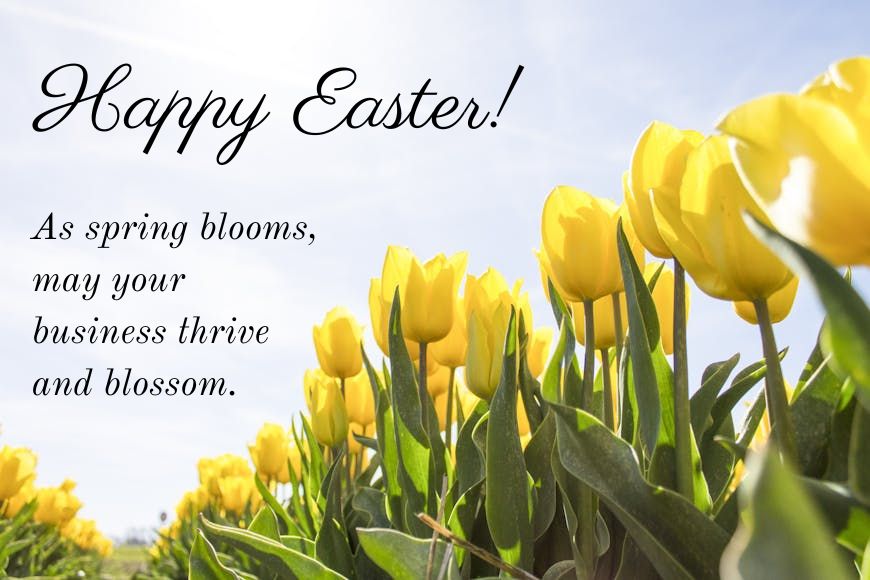 Yellow tulips in bloom with a 'happy easter!' greeting and a wish for a thriving business.