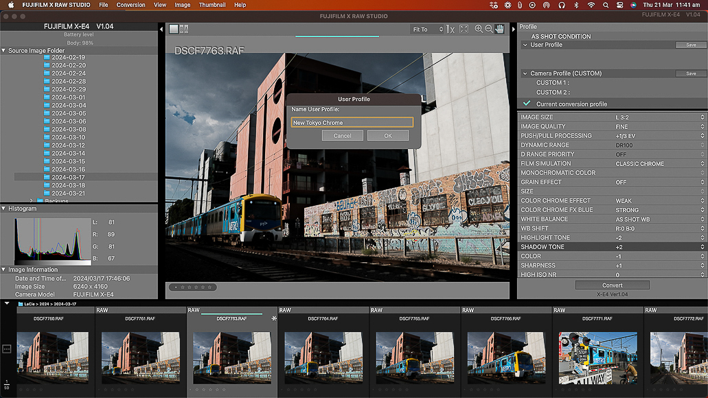 Screenshot of a photo editing software interface with an image of a train passing by graffiti-covered walls being processed.