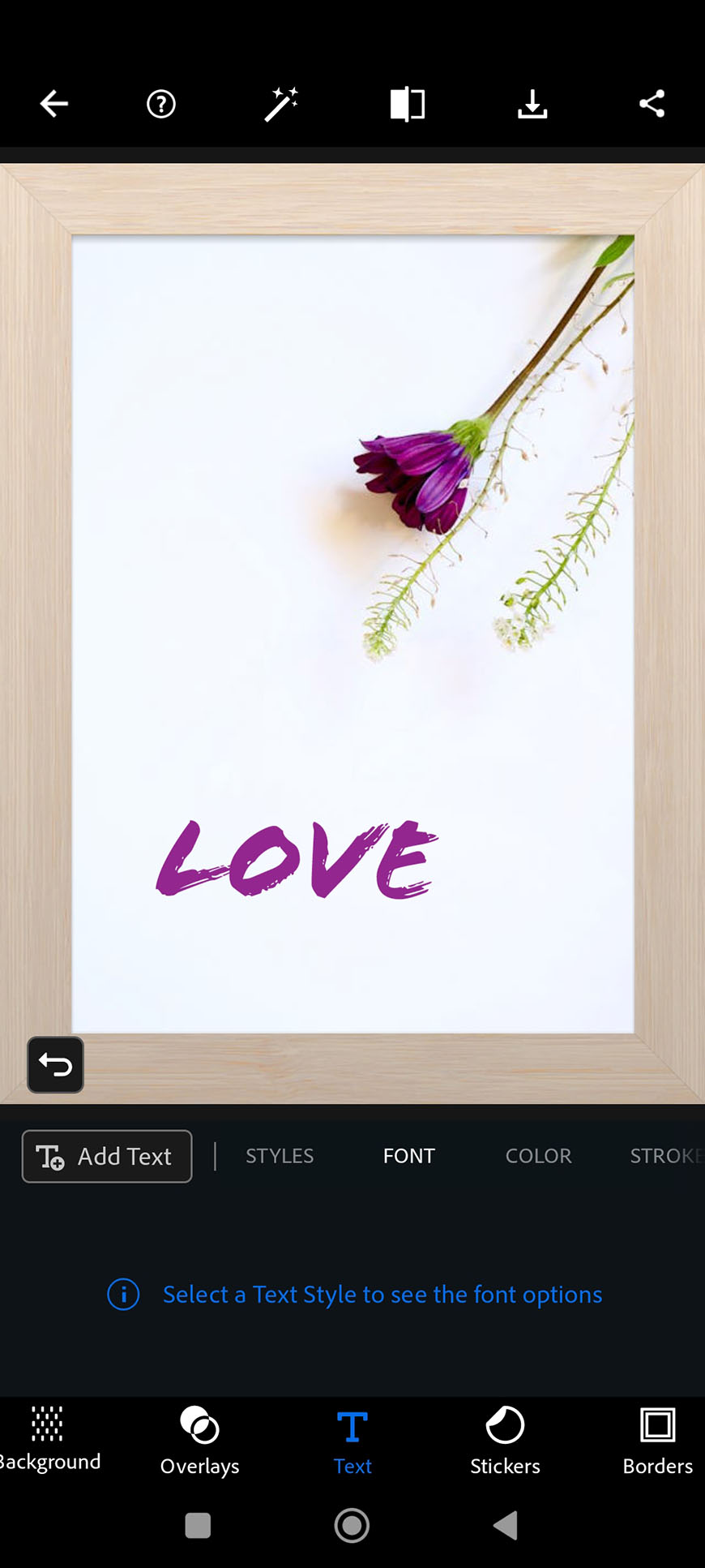 A framed graphic design of a purple flower with the word "love" written in purple, displayed on a phone editing interface.
