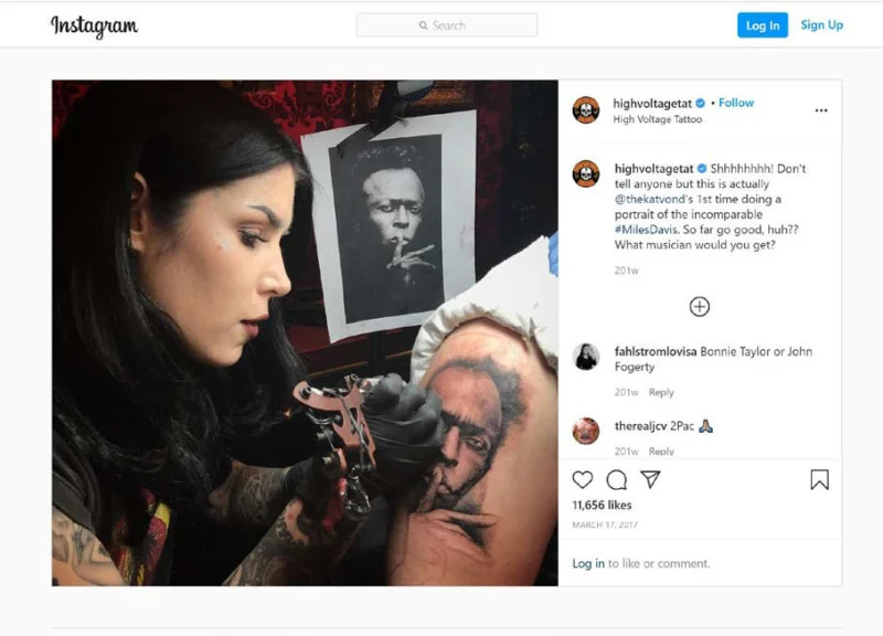 A tattoo artist at work, inking a portrait on a client's forearm, with social media interaction visible on the interface.