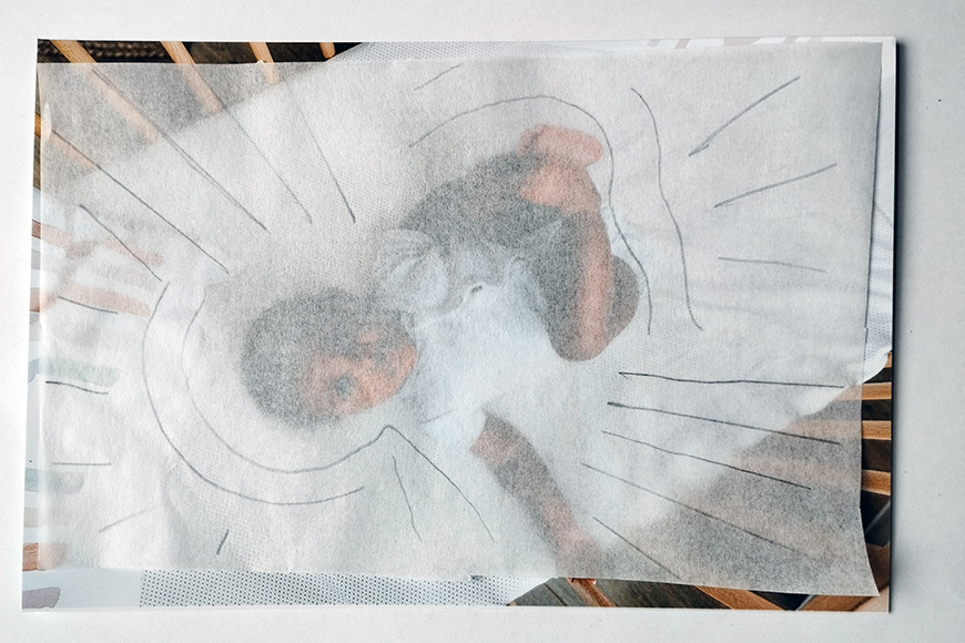Artistic print of a child sitting, visible through semi-transparent paper overlaid with sketched sun rays.
