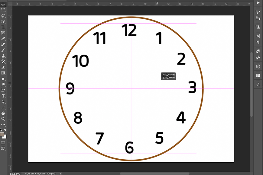 A screenshot of a graphical design interface showing a clock face design with numbers 1-12 and guide lines.