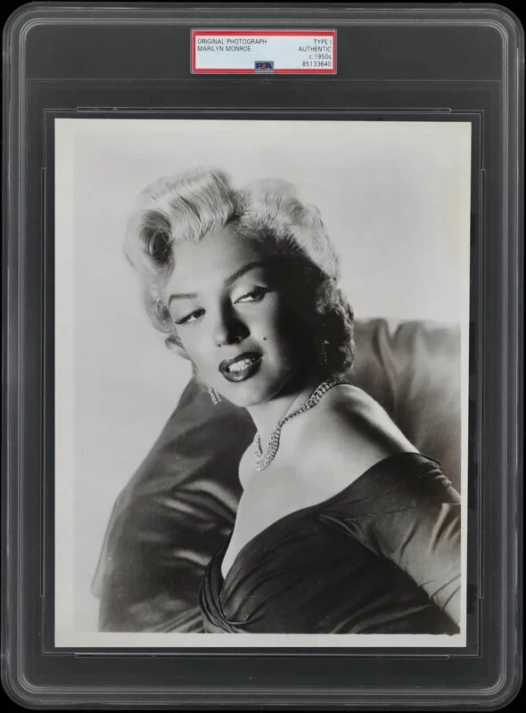 Vintage black and white portrait of a glamorous woman from classic hollywood era.