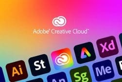 Colorful gradient background featuring adobe creative cloud logo and various adobe application icons such as photoshop, illustrator, and premiere.