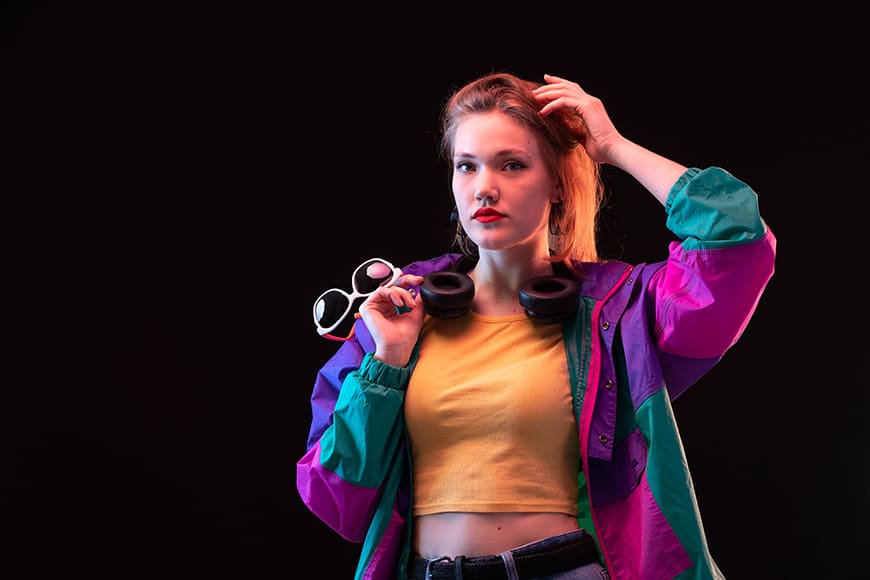 https://shotkit.com/wp-content/uploads/2026/05/Neon-Photoshoot-Ideas-%E2%80%9880s-Inspired-Looks-Creative-Lighting-Posing-Tips-8.jpg