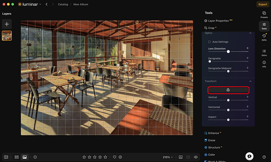 A photo editing software interface shows a sunlit cafe image with grid overlay and crop tool options visible in the sidebar.