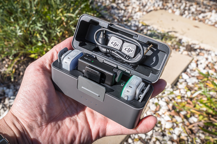 The Charging Case automatically starts recharging the Mini Receiver and transmitters as soon as they’re placed inside.