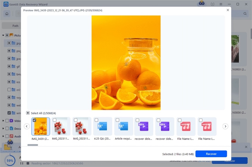 A computer screen shows a file recovery program previewing an image of a glass jar and several oranges on an orange background. Recovery options and file thumbnails are visible below.
