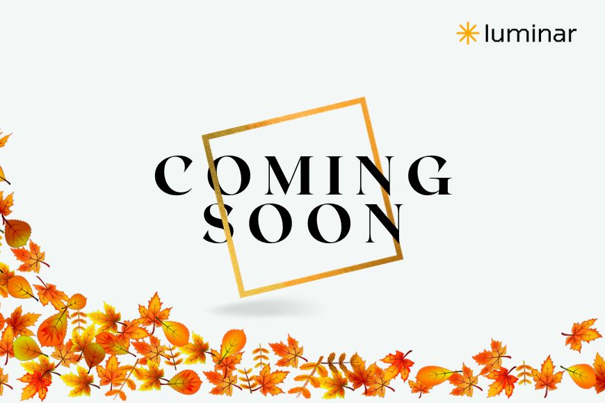 Coming Soon“ text inside a gold square with autumn leaves at the bottom, and the Luminar logo in the top right corner on a light background.