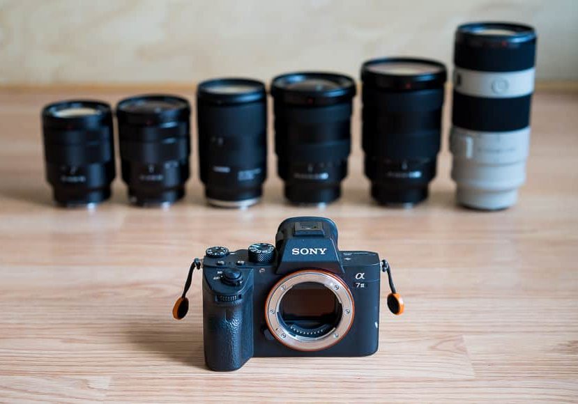 sony lenses on table with camera