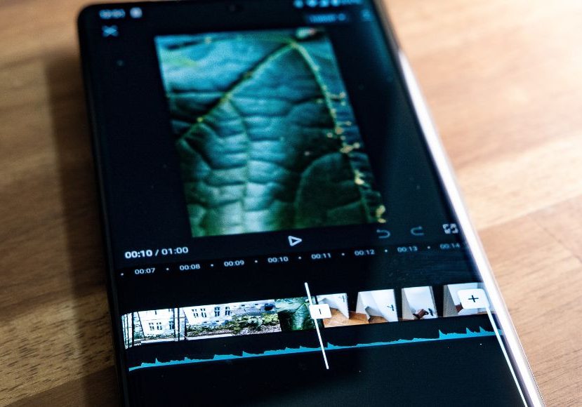 A smartphone with a video editor on it.